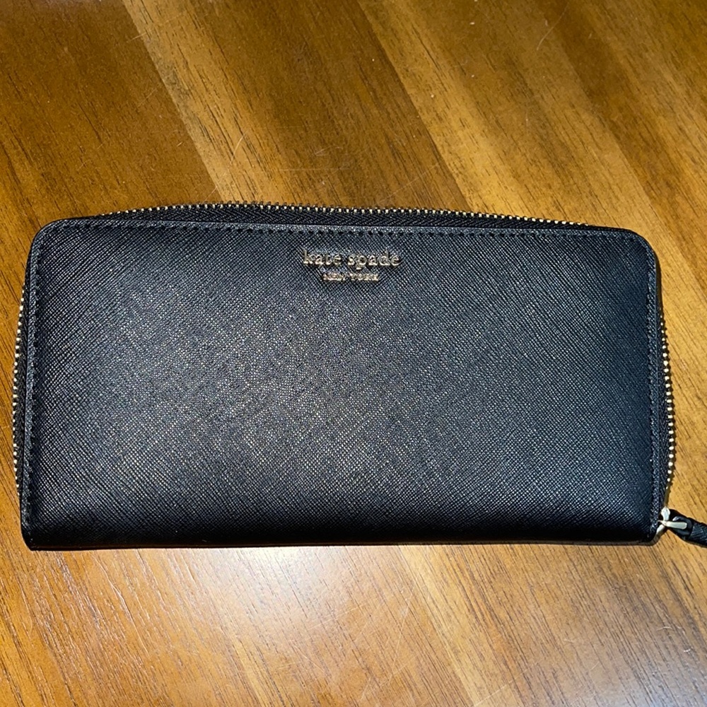 Kate spade black wallet with 12 card slots and coin pouch